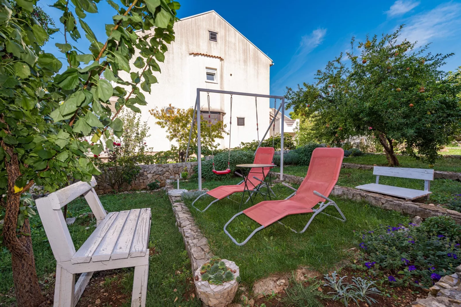 Apartments Bruna - one bedroom apartment A2-Gardens in summer