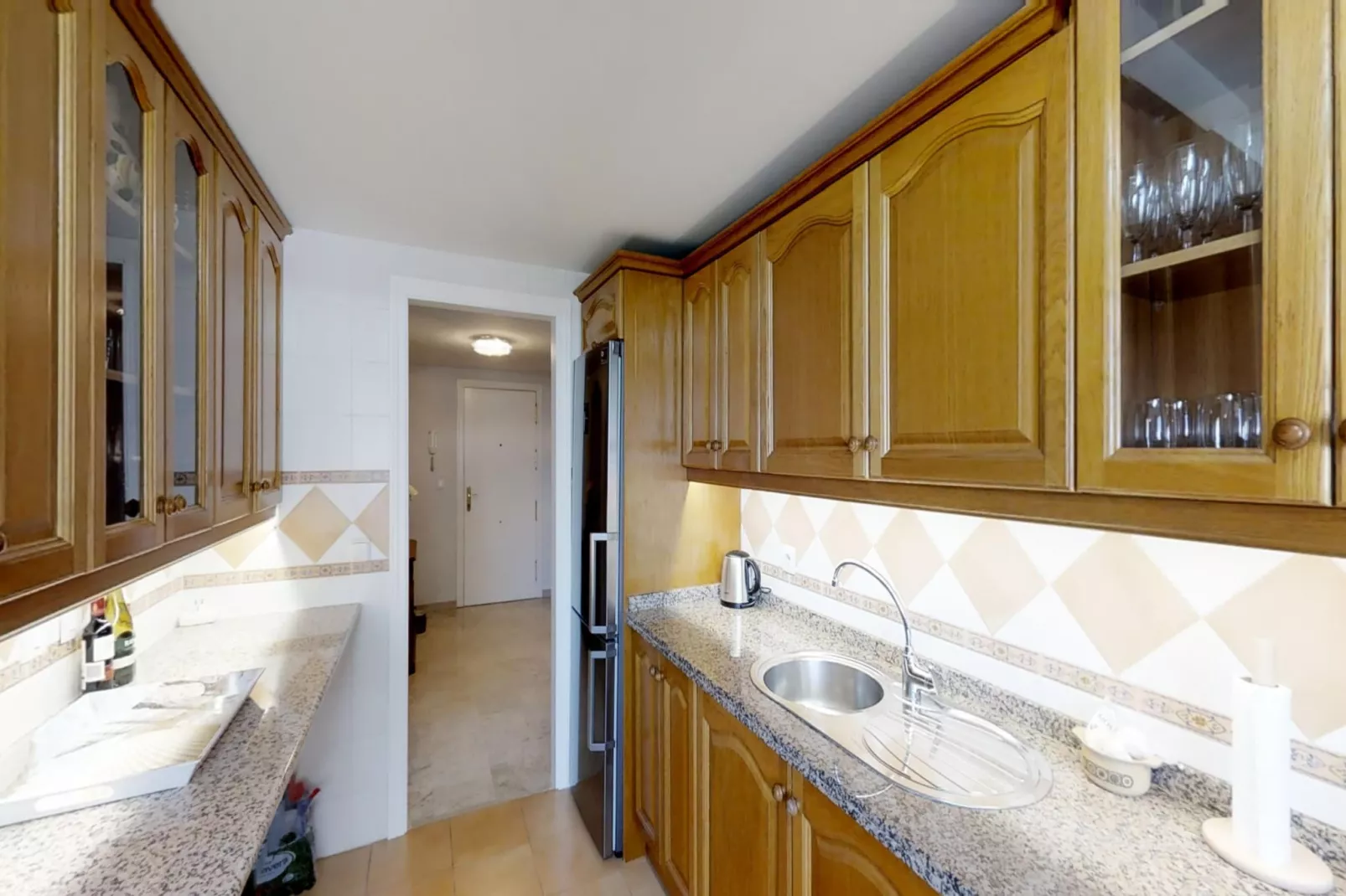 Beachside Family Apartment with Direct Pool Access - Kitchen