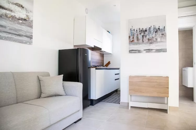 Village Marina di Cortellazzo Lido di Jesolo Pineta Bungalow Superior - Wohnzimmer