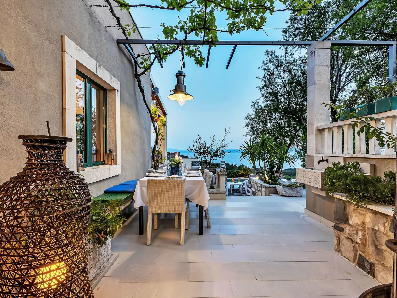 "Villa Rita" mit Blick auf das Wasser - Dehors