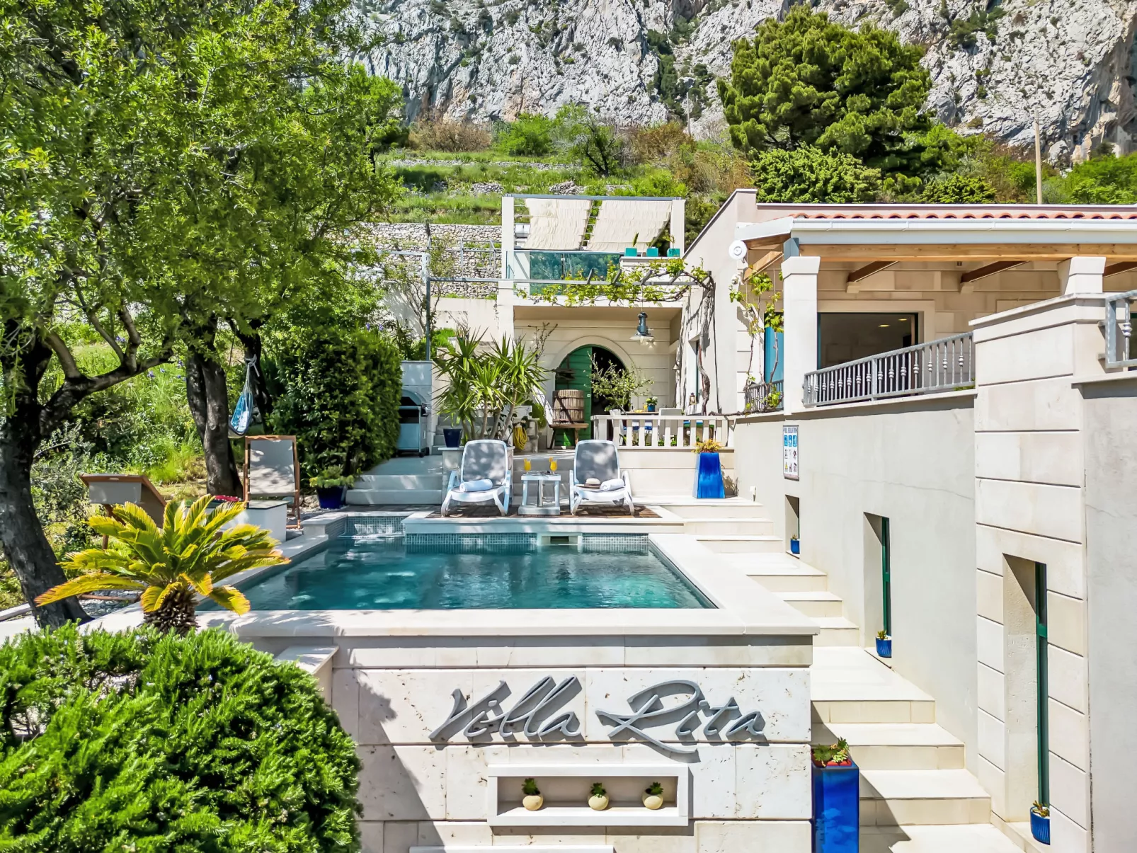 "Villa Rita" mit Blick auf das Wasser - Dehors