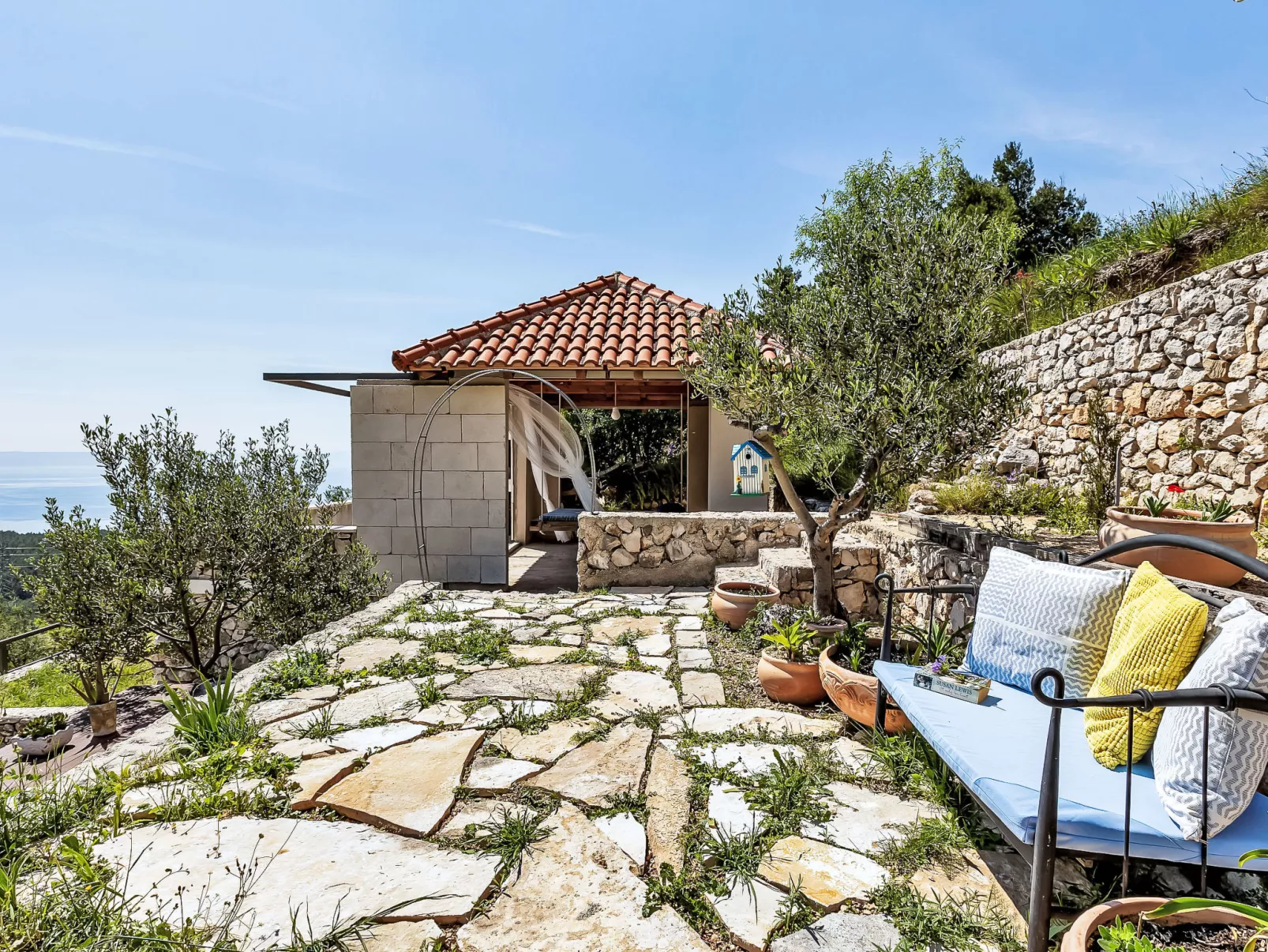 "Villa Rita" mit Blick auf das Wasser - Dehors