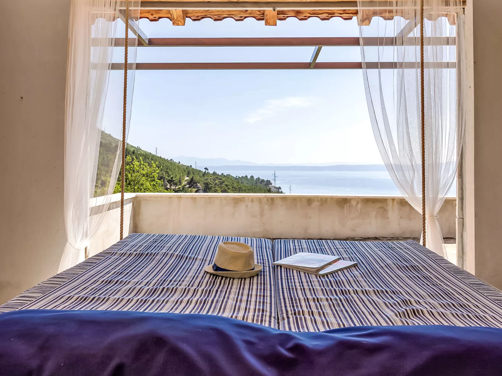 "Villa Rita" mit Blick auf das Wasser - Dehors