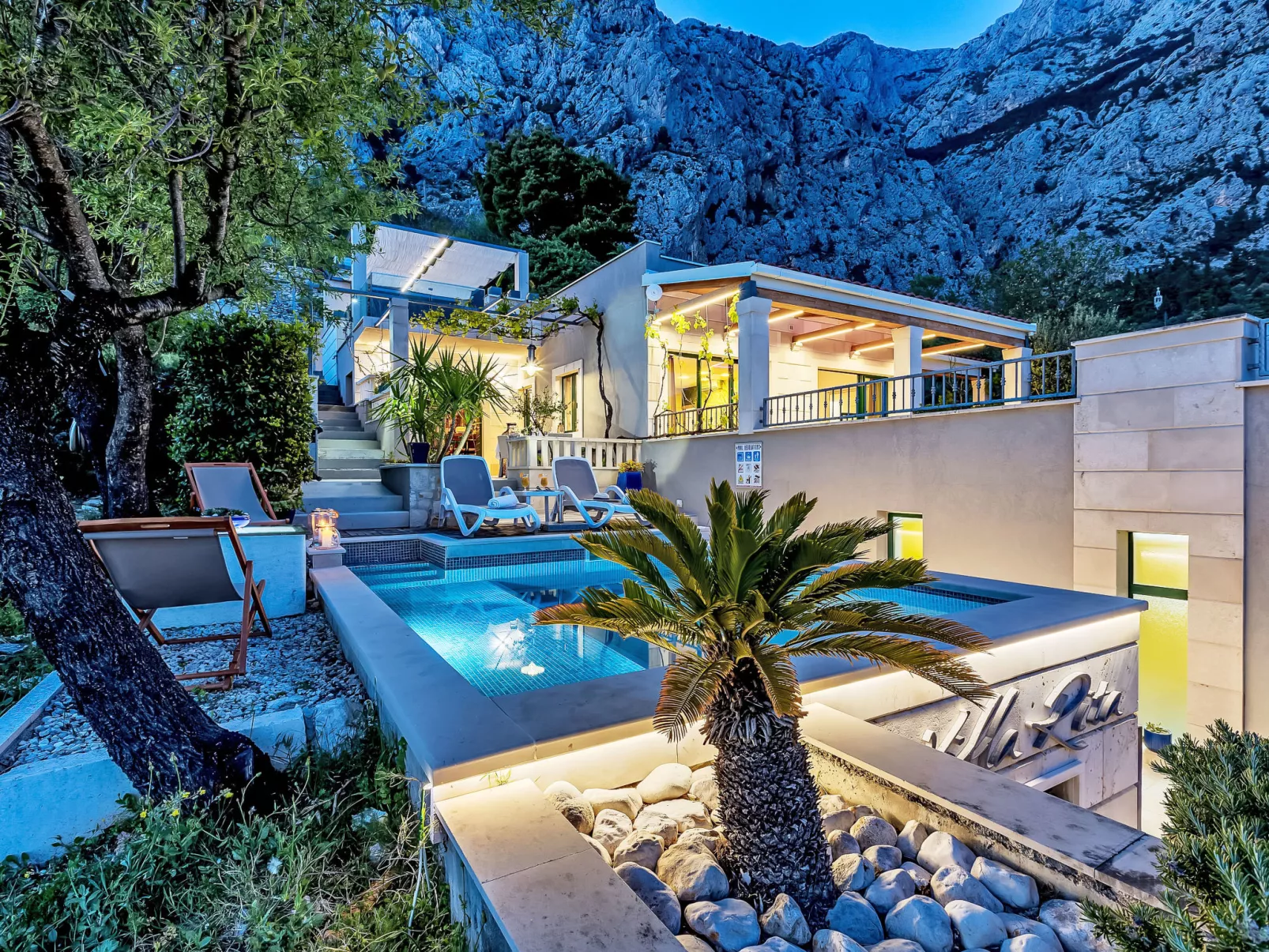 "Villa Rita" mit Blick auf das Wasser - Dehors