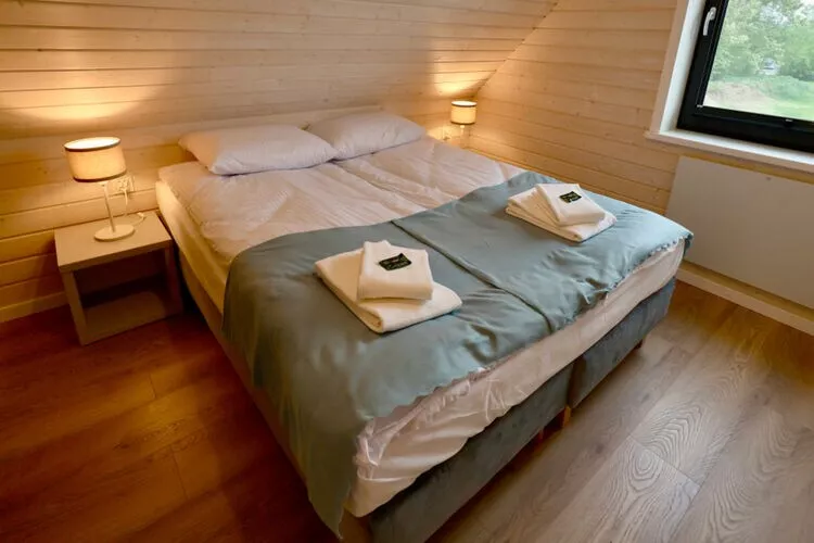 Połowa domu wakacyjnego przy plaży w Stepnicy-Bedroom