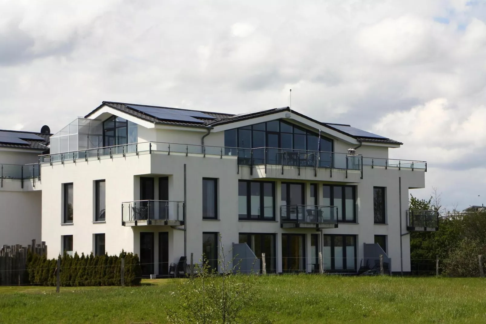 Appartementhaus Calmsailing Börgerende-Appartement 23 Meerblick 2 OG - Außenbereich Sommer