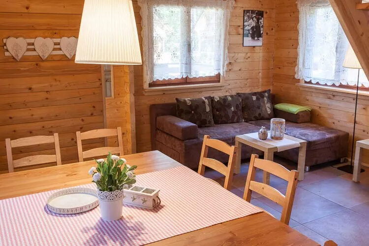 Drewniane domki wakacyjne Pobierowo-Living room
