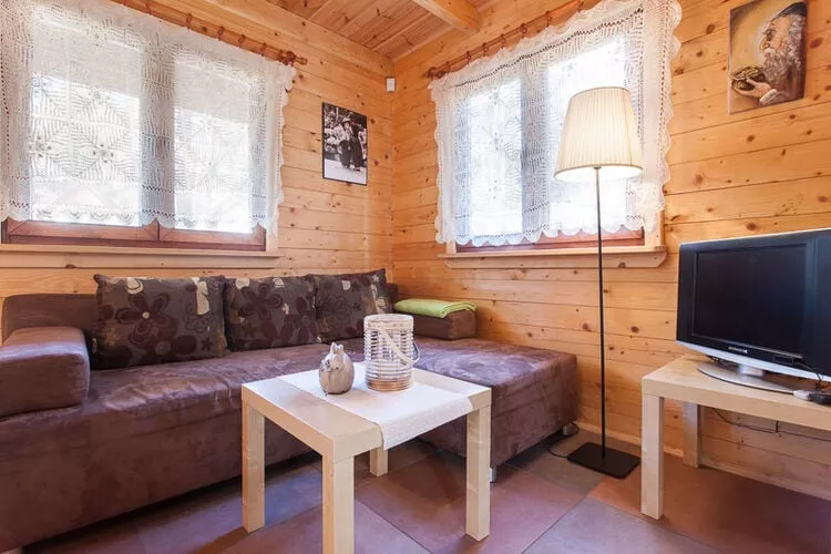 Drewniane domki wakacyjne Pobierowo-Living room