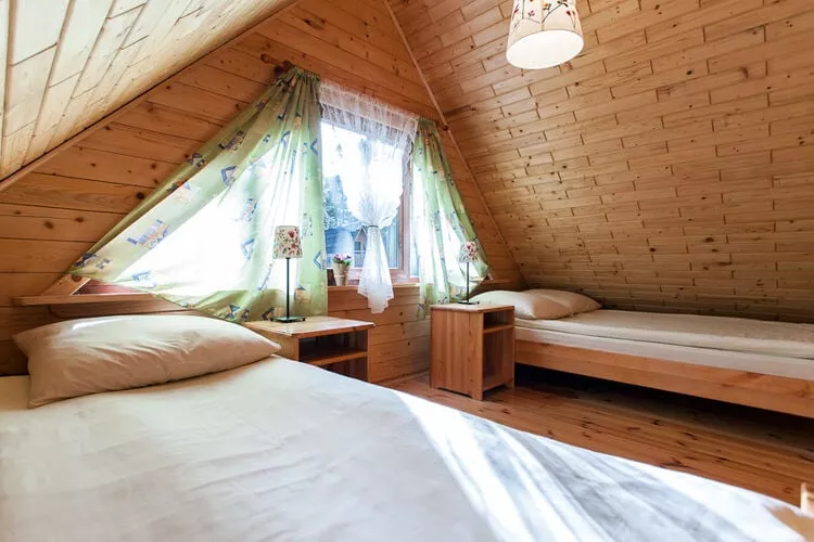 Drewniane domki wakacyjne Pobierowo-Bedroom