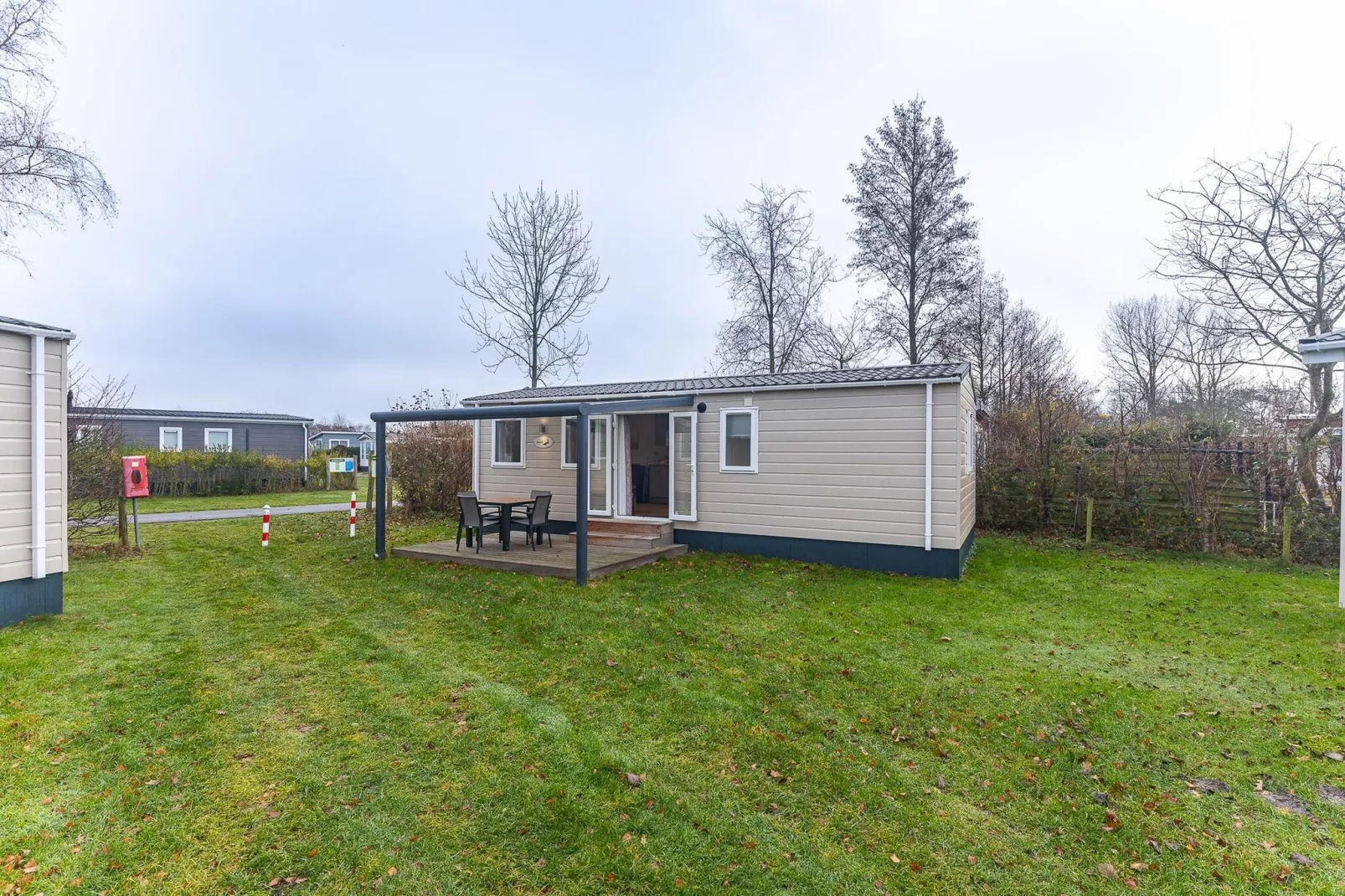 Duinhoeve Chalet Vogel - Huisdier niet toegestaan - Außenbereich Sommer