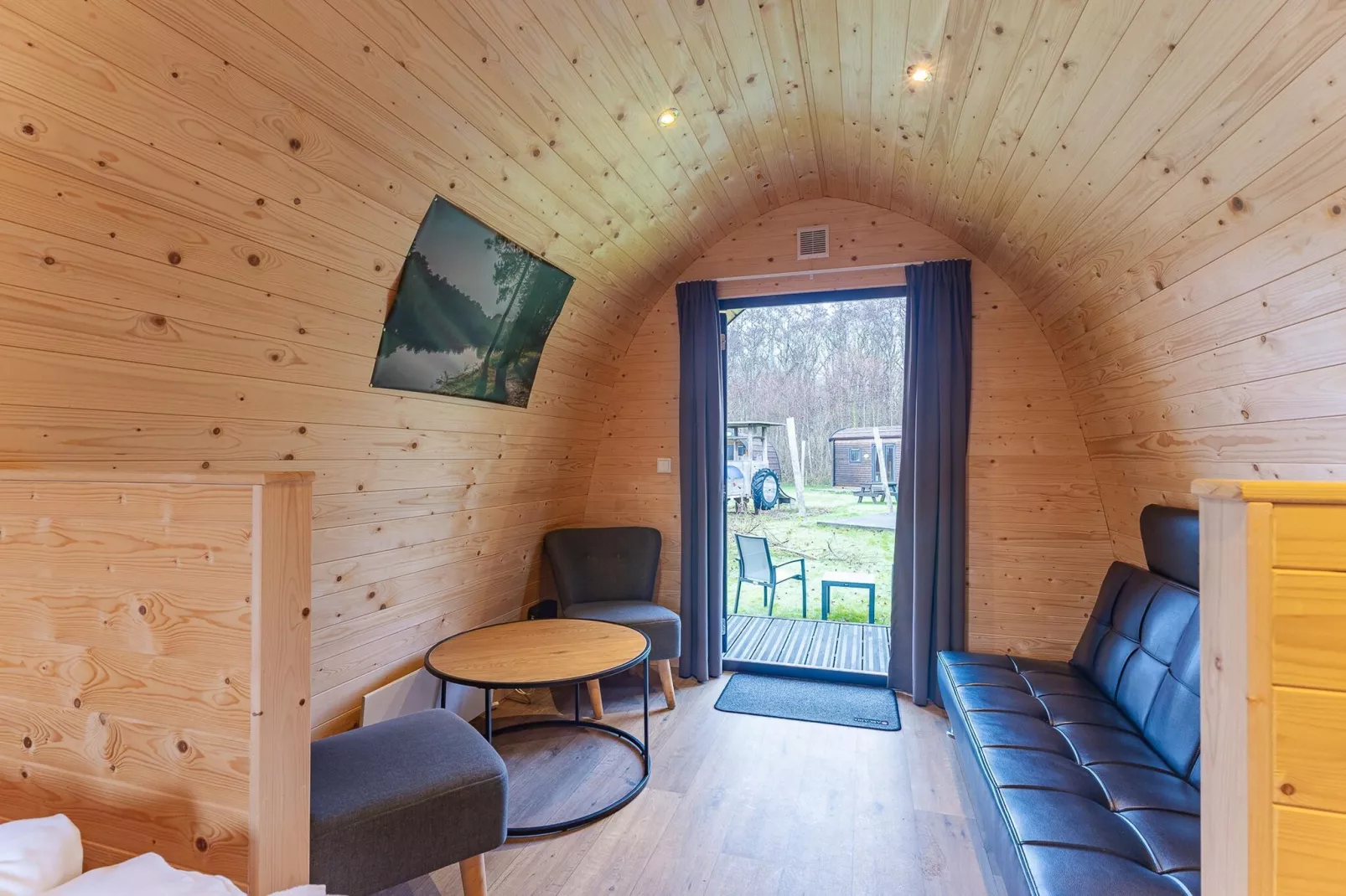 Duinhoeve Duinlodges 2 pers (huisdiervriendelijk) - Wohnzimmer