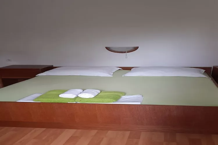 Apartments Snjezana - One Bedroom Apartment with Balcony and Sea View A1 - Bedroom