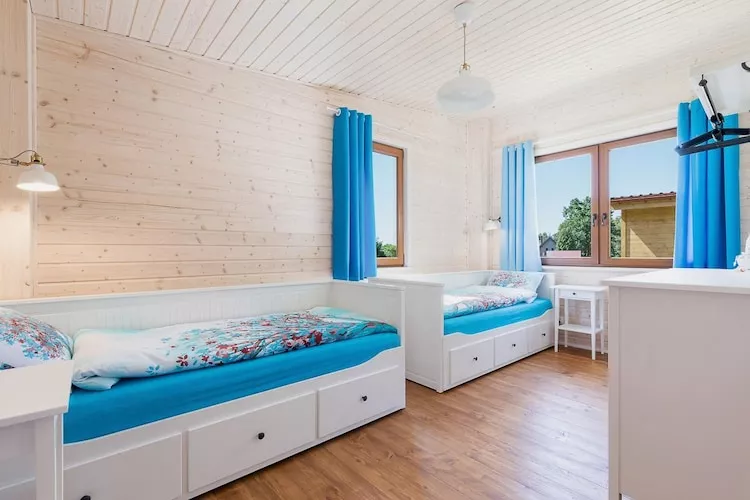 Domy wakacyjne z basenem blisko morza Rewal - Chambre