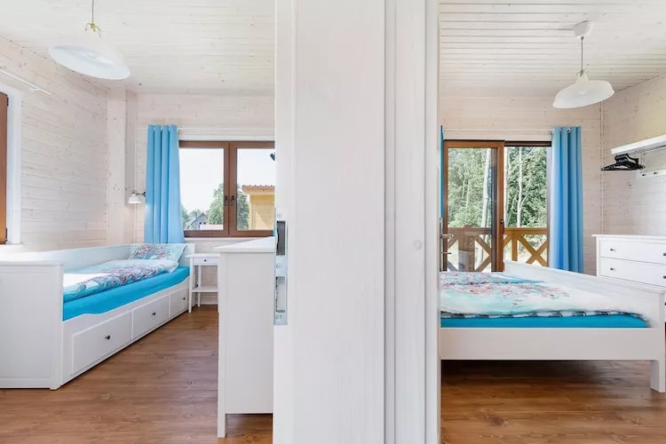 Domy wakacyjne z basenem blisko morza Rewal - Chambre