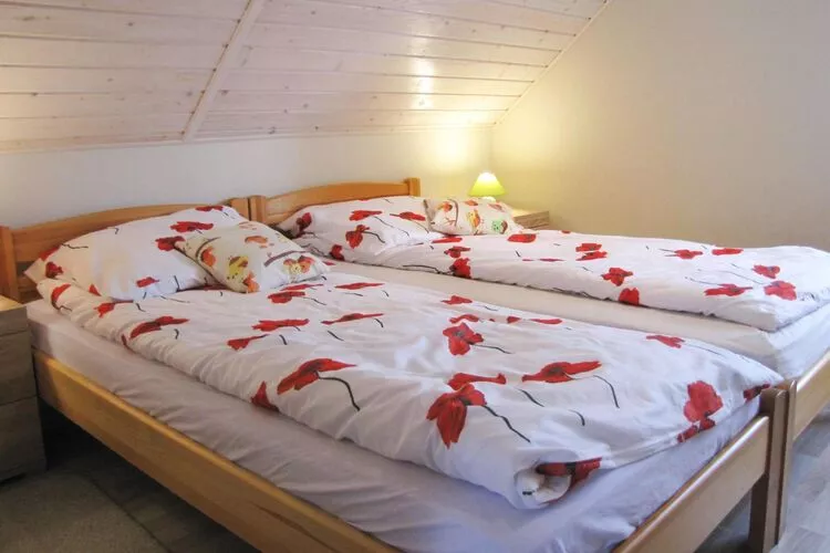 Holiday flat Ryn Apartament 56qm-Bedroom