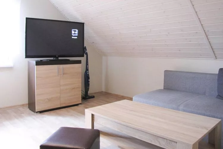 Holiday flat Ryn Apartament 56qm-Bedroom
