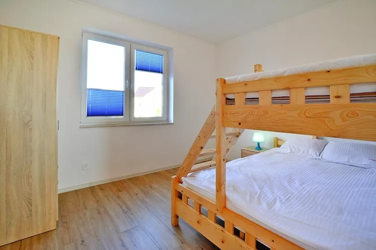 Domy wakacyjne z basenem letnim dla max 4 osób Jarosławiec - Bedroom