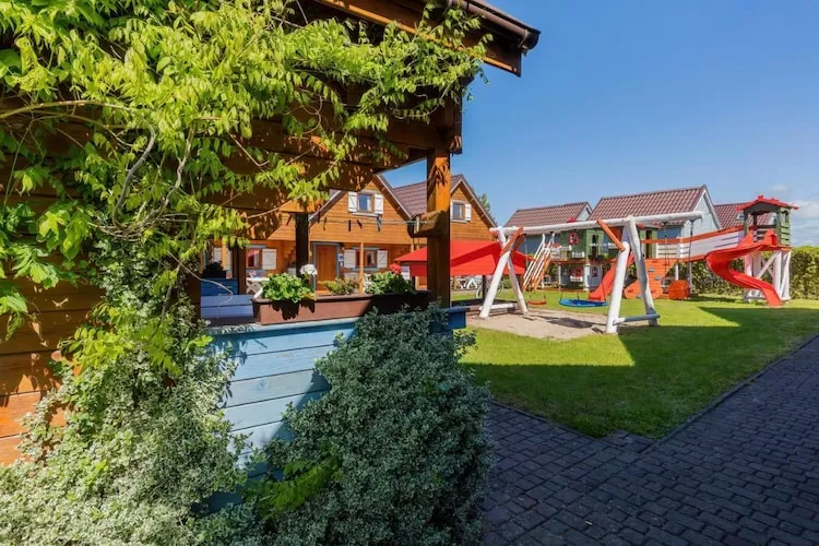 Domki wakacyjne w Rewalu - Jardins en été