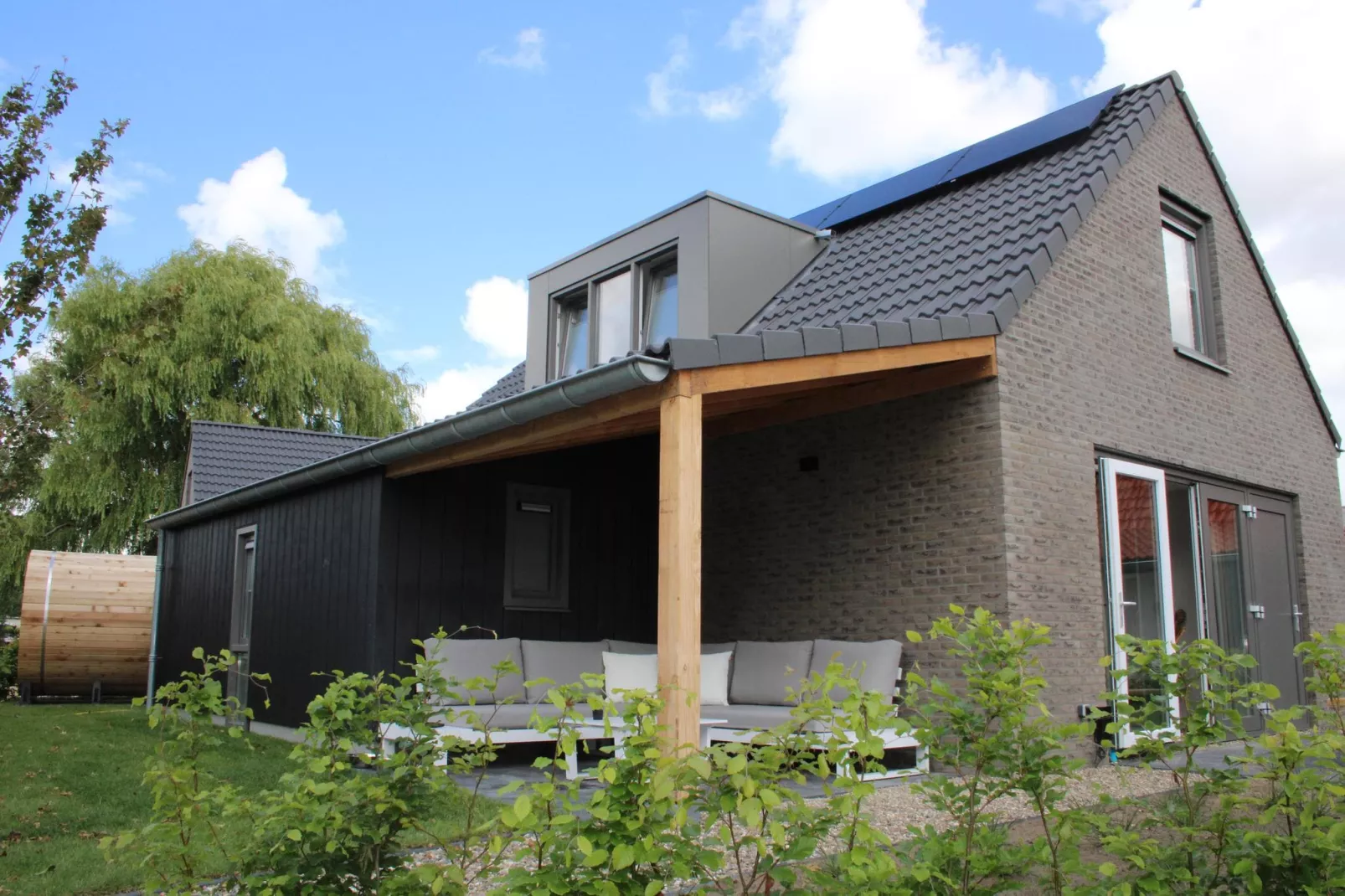 Vakantiehuis Ultiem Genieten - 80 - Außenbereich Sommer