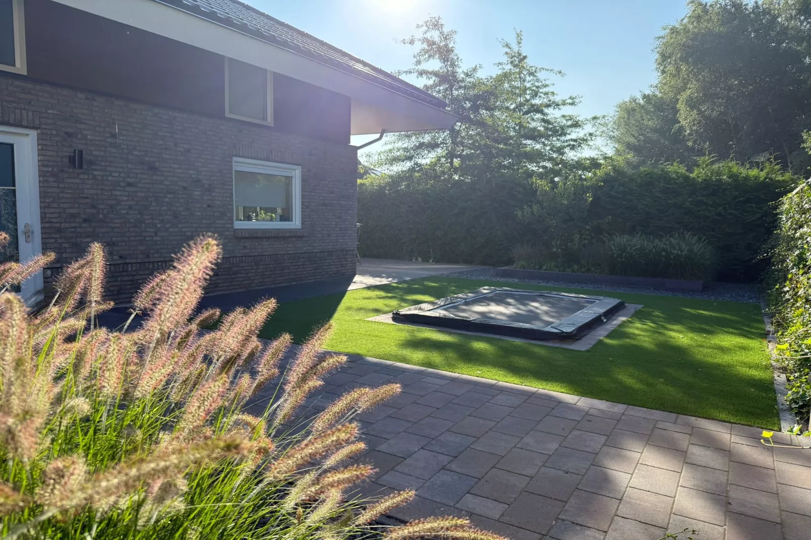 Holiday home Torenvalk - Gardens in summer