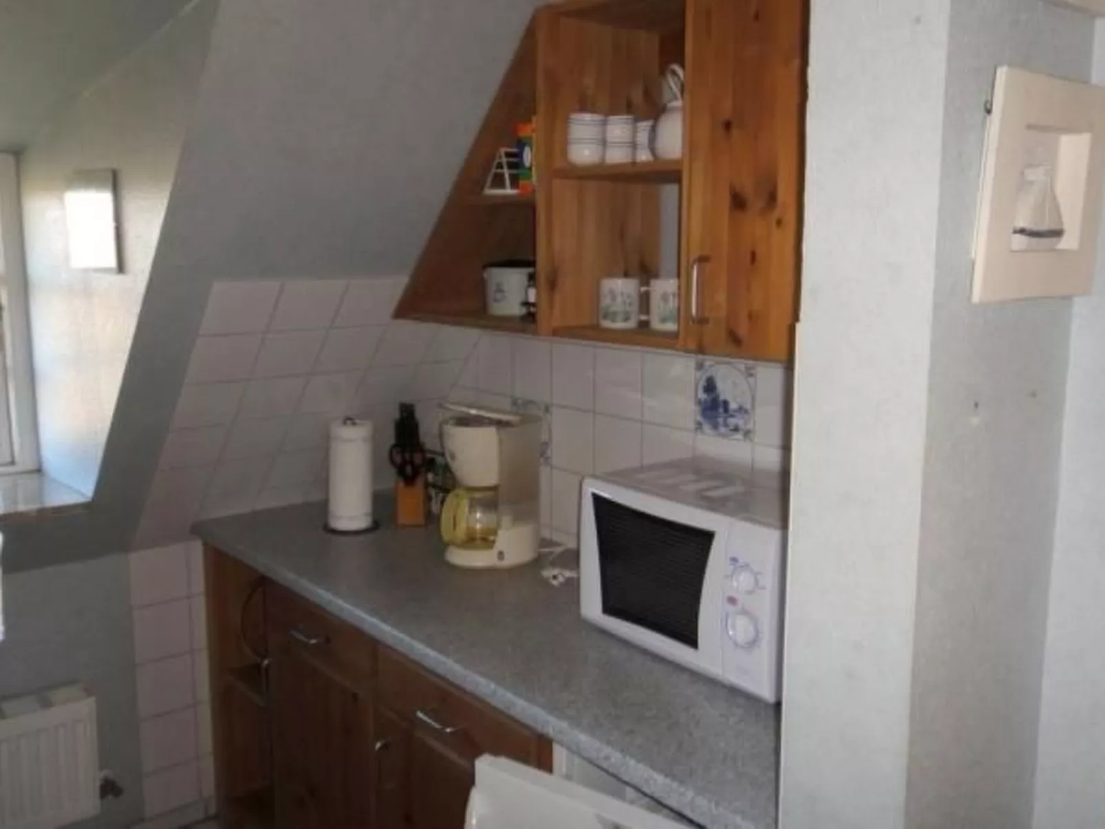 Wohnung in einem reetgedeckten Friesenhaus aus dem Jahr 1860 - Drinnen