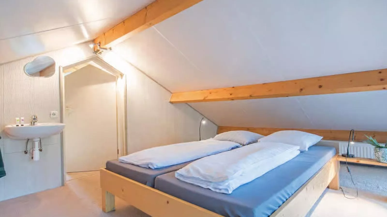 De Rode Ibis - Schlafzimmer