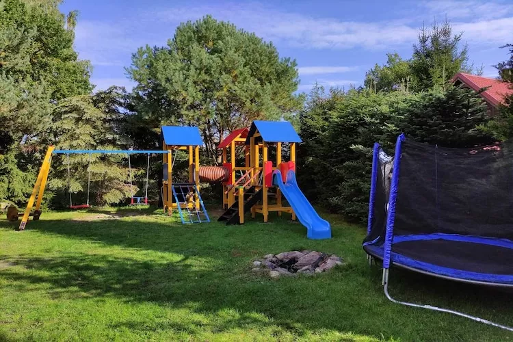 Całoroczny dom wakacyjny w Kopalinie - Jardins en été