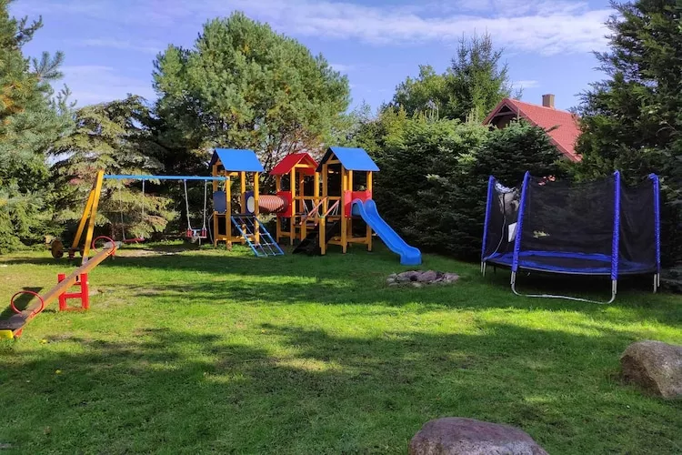 Całoroczny dom wakacyjny w Kopalinie - Jardins en été