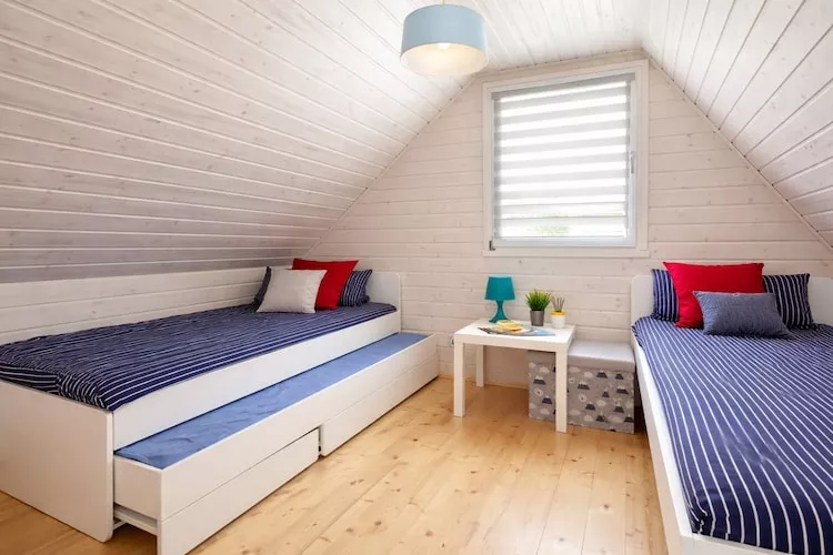 Holiday homes Rewal 60 qm Kapitäns Haus - Chambre