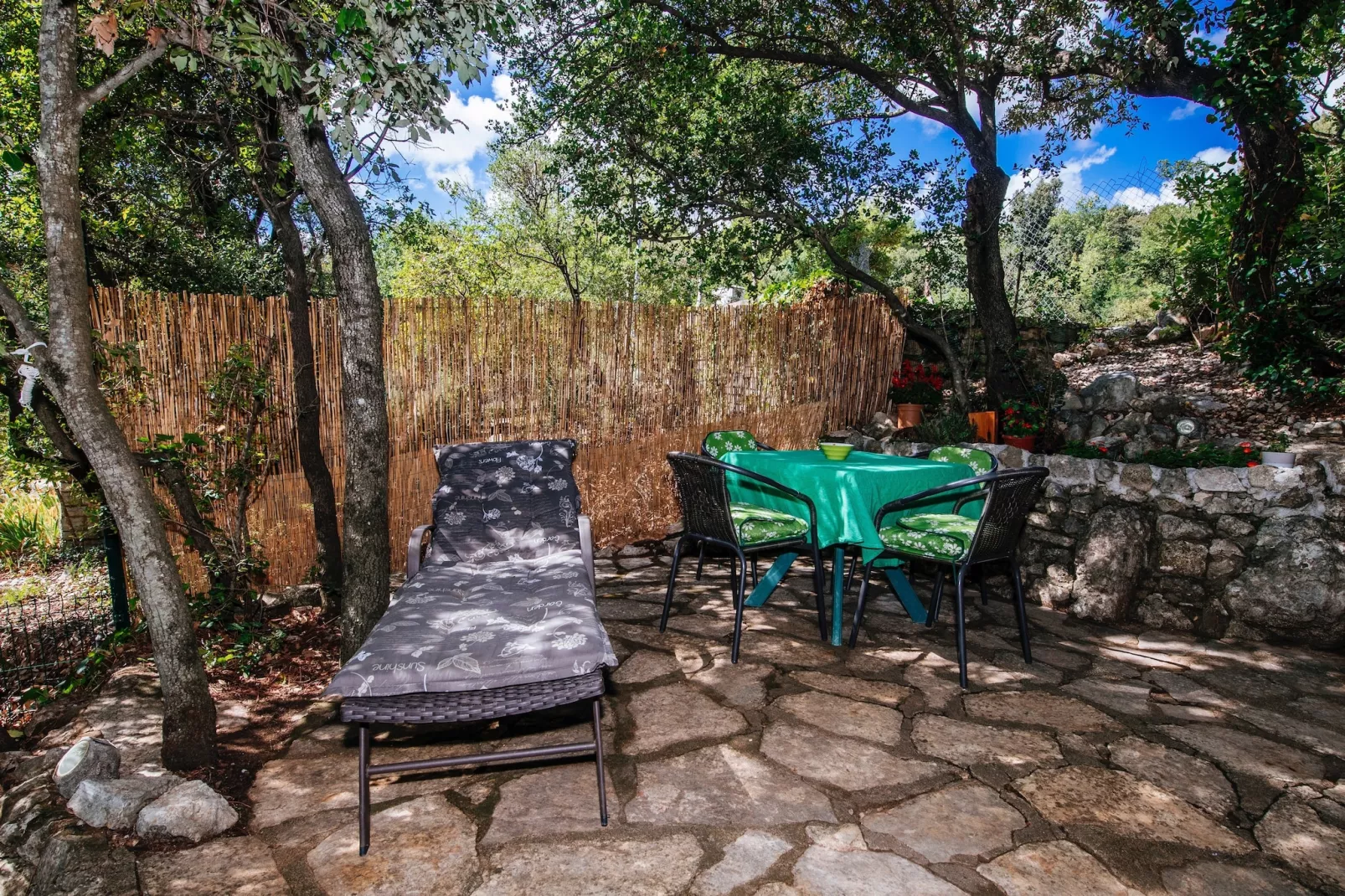Beachfront  house Dunja - Gardens in summer