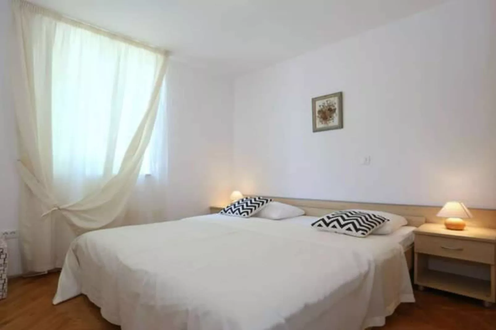 Beachfront Apartments Tamarix - One Bedroom Apartment with Partial Sea View - Bedroom