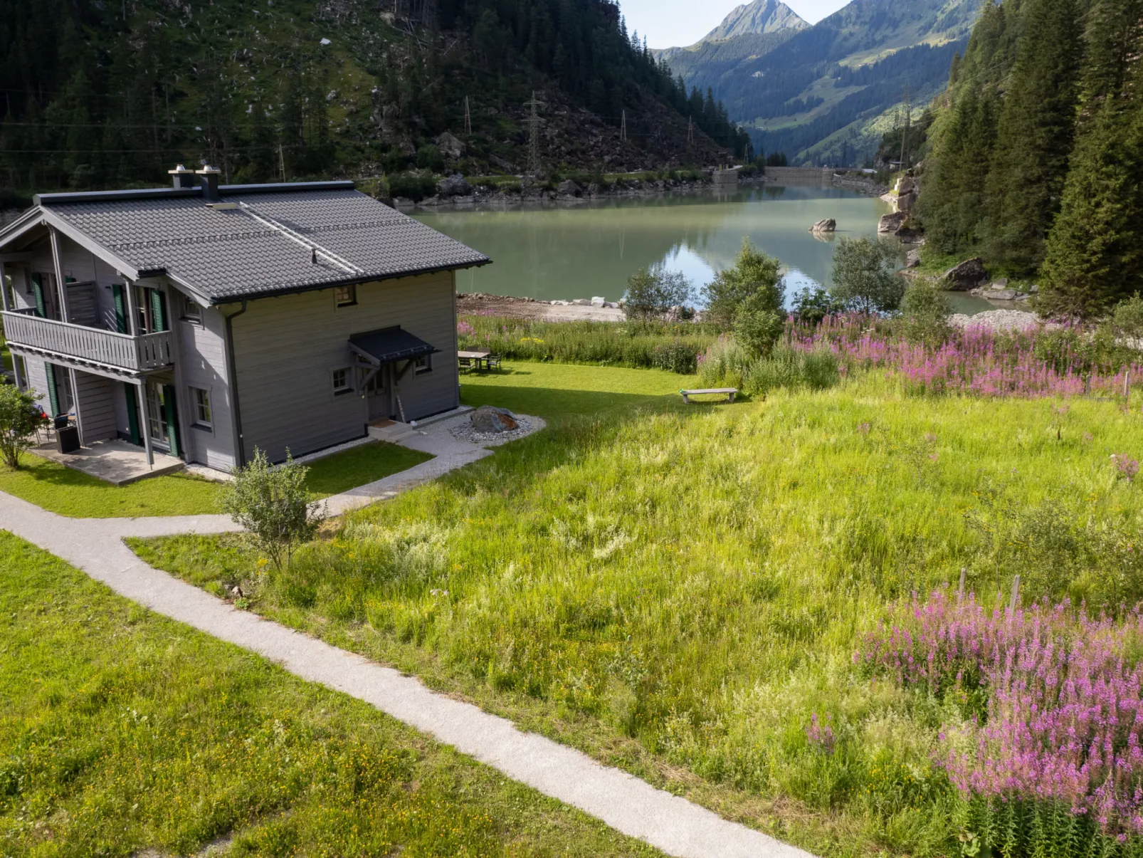 Lodge Seeblick 161 im Tauerndorf Enzingerboden - Draußen
