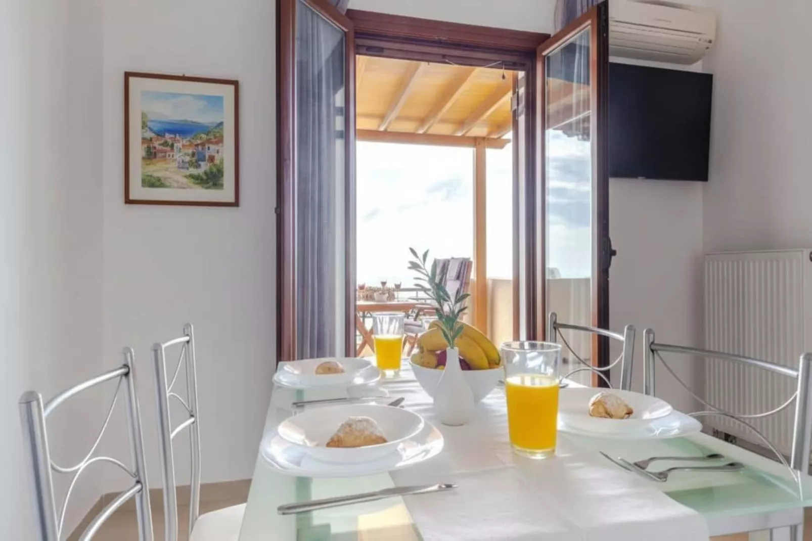 Stylish Santorini Residence with Endless Sea Views - Dining room