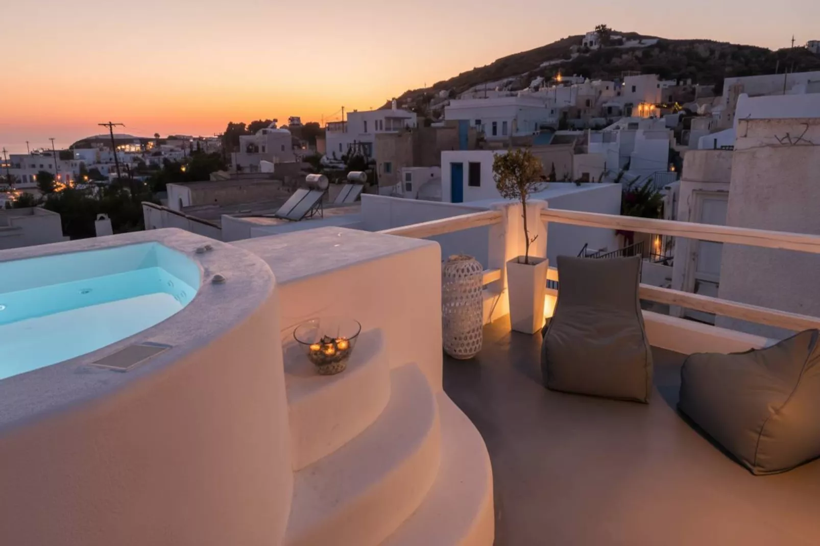 Poseidon’s Water Escape Santorini Rooftop Jacuzzi - View in summer