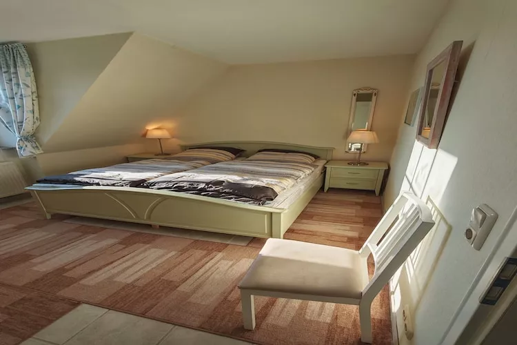 Ferienwohnung Gartenblick - Schlafzimmer