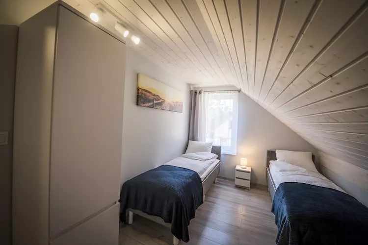 Domy wakacyjne 5-os FGH - Schlafzimmer