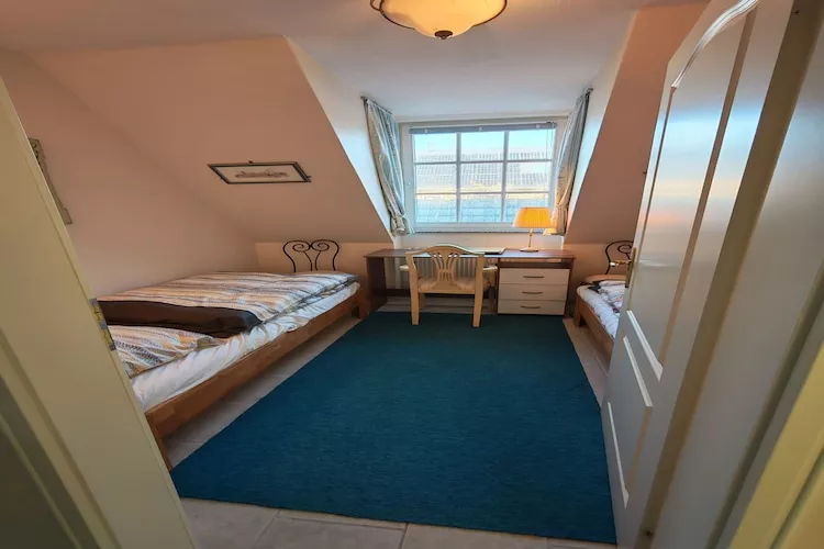 Ferienwohnung Gartenblick - Schlafzimmer