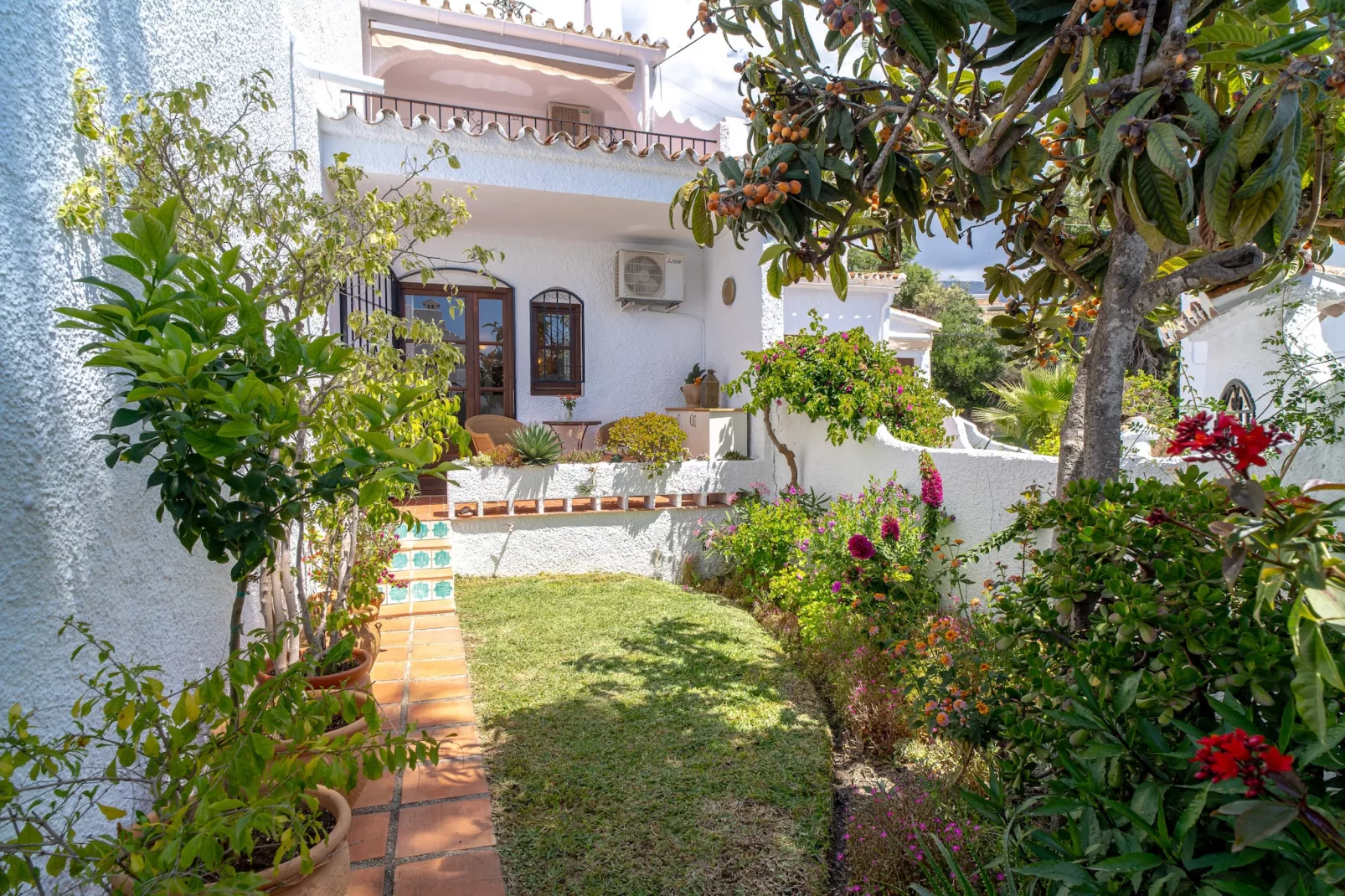 Capistrano Village Casa Emma by Casasol - Gardens in summer