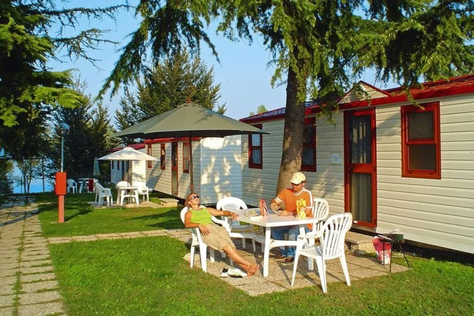 Caravanpark San Benedetto Camping Relais Peschiera / MH 4/5 / Chalet-Exterior summer