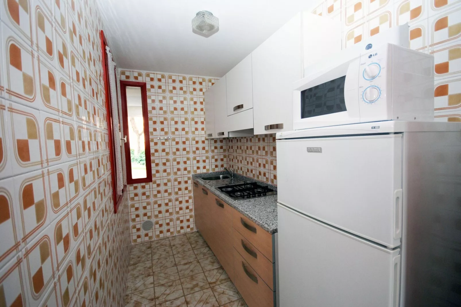 Holiday Village in Ligano-Sabbiadoro - TIPO D-8-Kitchen