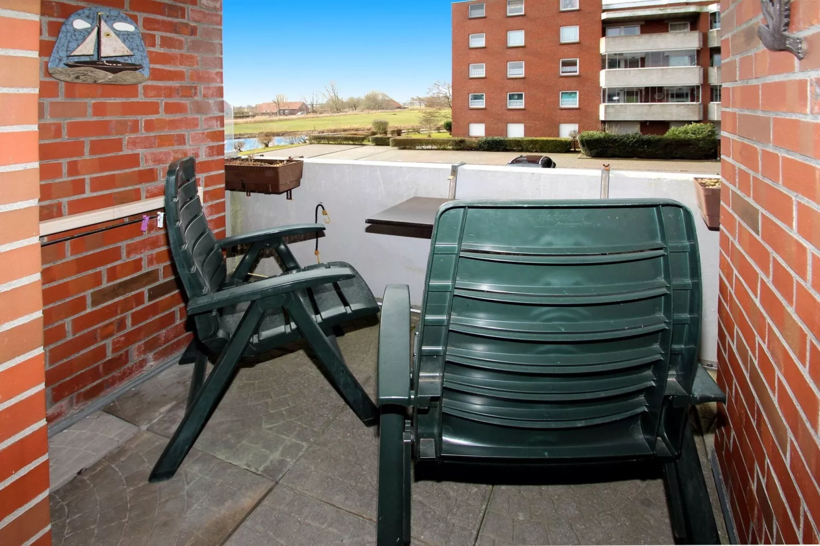 Ferienwohnung mit Balkon für Zwei in Dornumersiel-Terrace balcony