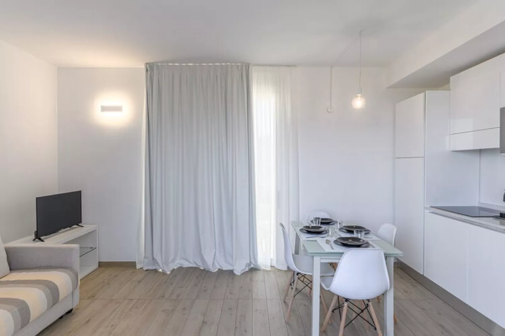 Residence Capo Falcone Stintino "Trilo 6 Premium"-Living room
