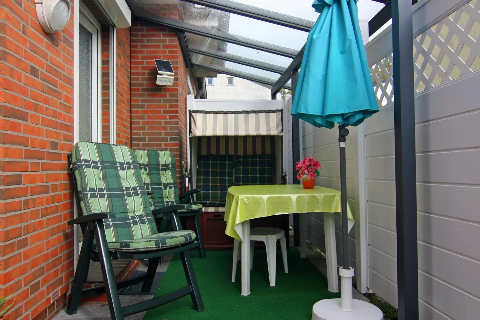 App 1 / 3 Raum App im EG 65 m²-Terrace balcony