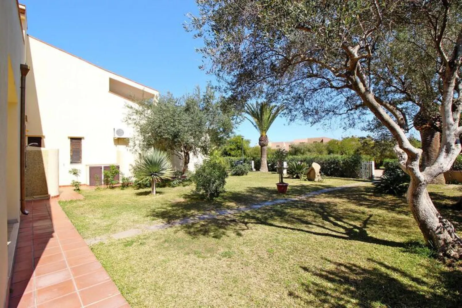 Ferienresidence Villaggio Turagri Costa Rei Trilo - Type Trilo-Gardens summer