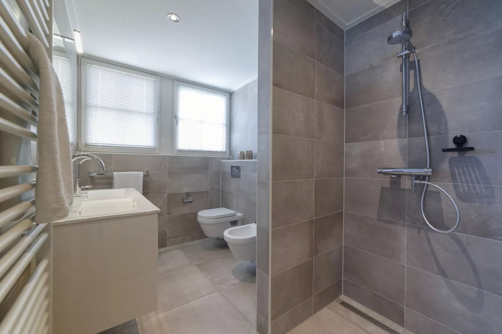 6 persoons vrijstaand met sauna-Badezimmer