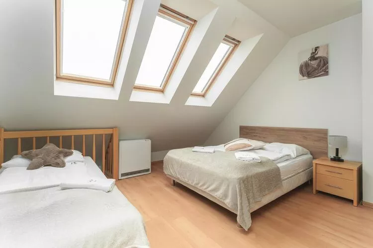 Apartament 2-poziomowy Bałtycka Rewal-Schlafzimmer