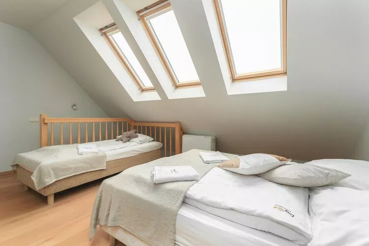 Apartament 2-poziomowy Bałtycka Rewal-Schlafzimmer