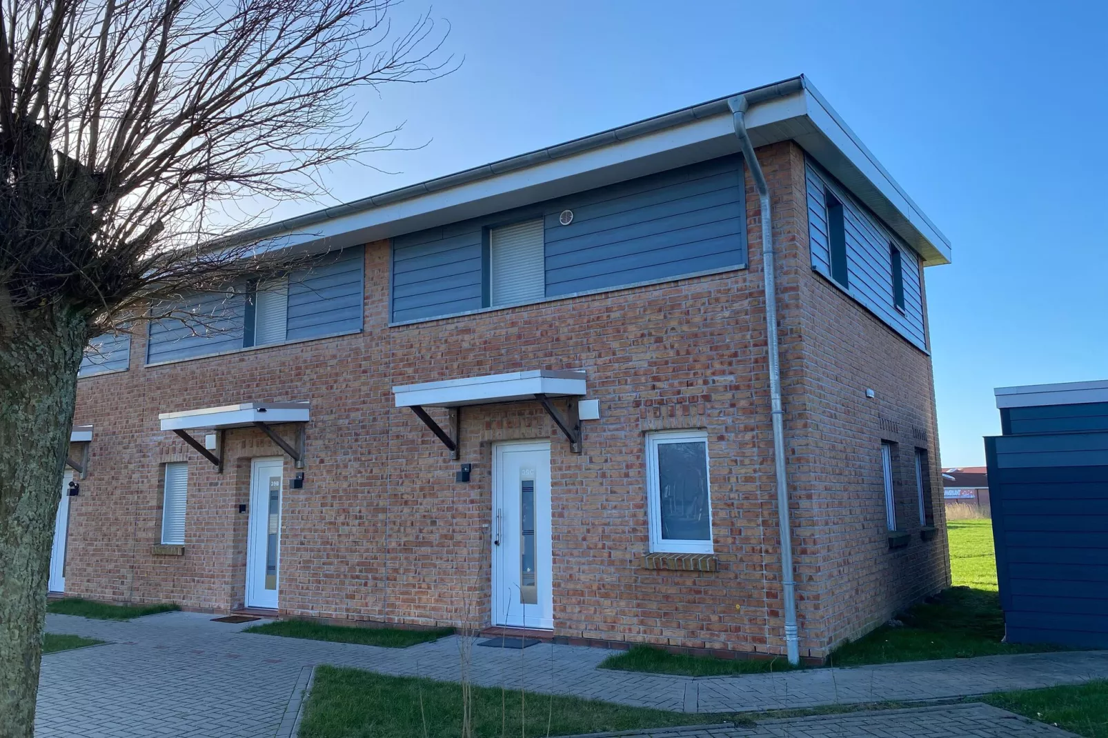 Ferienhaus Tossens Seestern Haus/Whg 3-Exterior winter