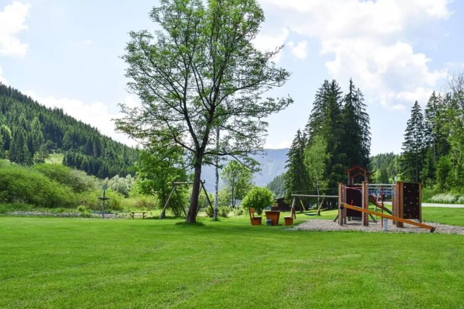 Ferienhütte Trabochersee-Gärten Sommer