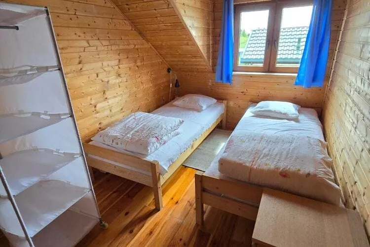 Domki wakacyjne STANDARD dla 4 osób Sarbinowo-Bedroom
